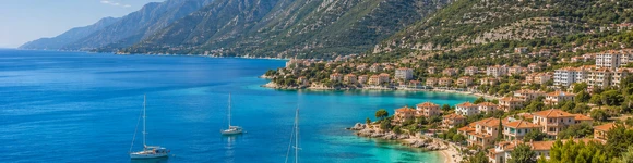 Dramatic mountains dropping into turquoise water along Albania's Riviera